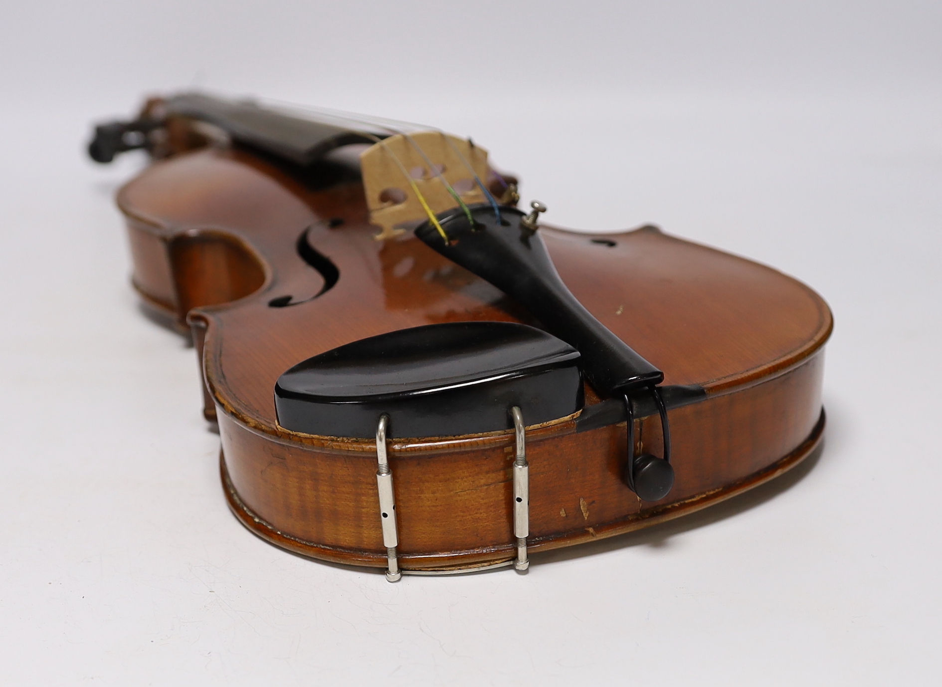 A cased early 20th century French violin, bears Strad label